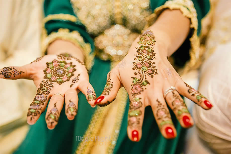 Hand's bride with henna tattoos in Morocco during a wedding