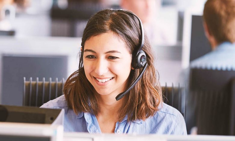 A brown headed girl in a call center