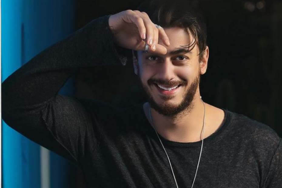 Saad Lamjarred, the leader of Moroccan and Arab music, posing for a photoshoot.