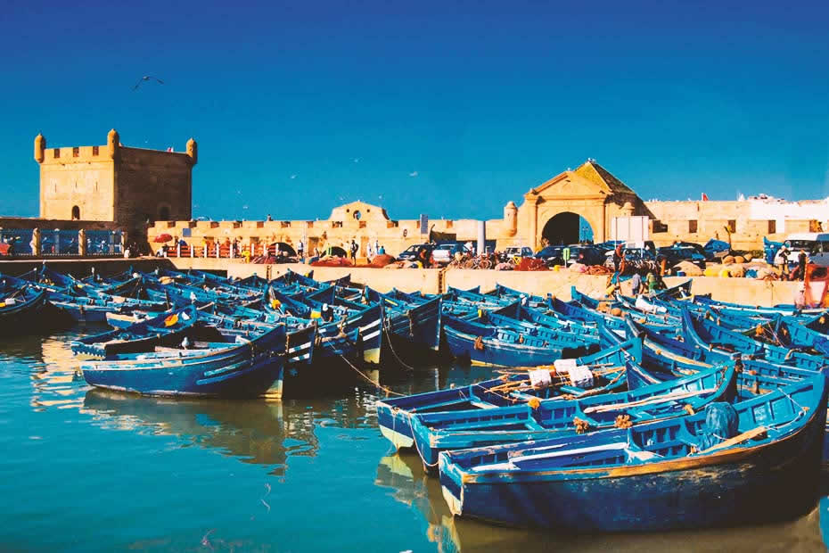 View of Essaouira's famous port and blue boats