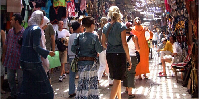 tourists in safety in a souk in morocco