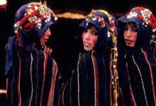 3 Moroccan woman wearing traditional moroccan clothing