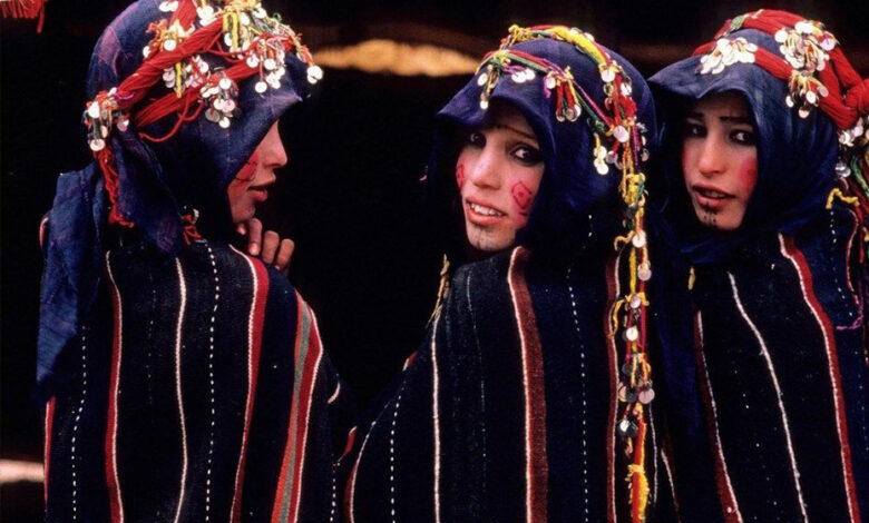 3 Moroccan woman wearing traditional moroccan clothing