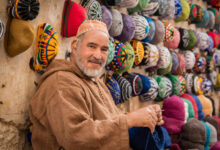 A moroccan man looking at the camera and asking himself what is morocco known for