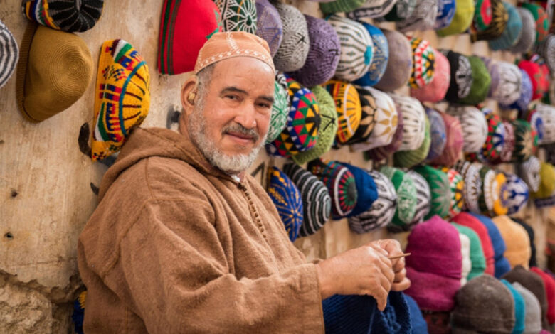 A moroccan man looking at the camera and asking himself what is morocco known for