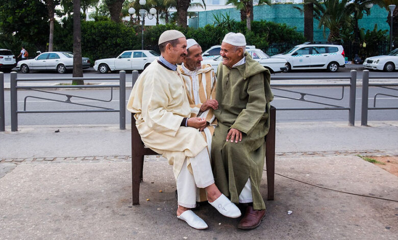 3 Moroccan men speakin the national language of morocco